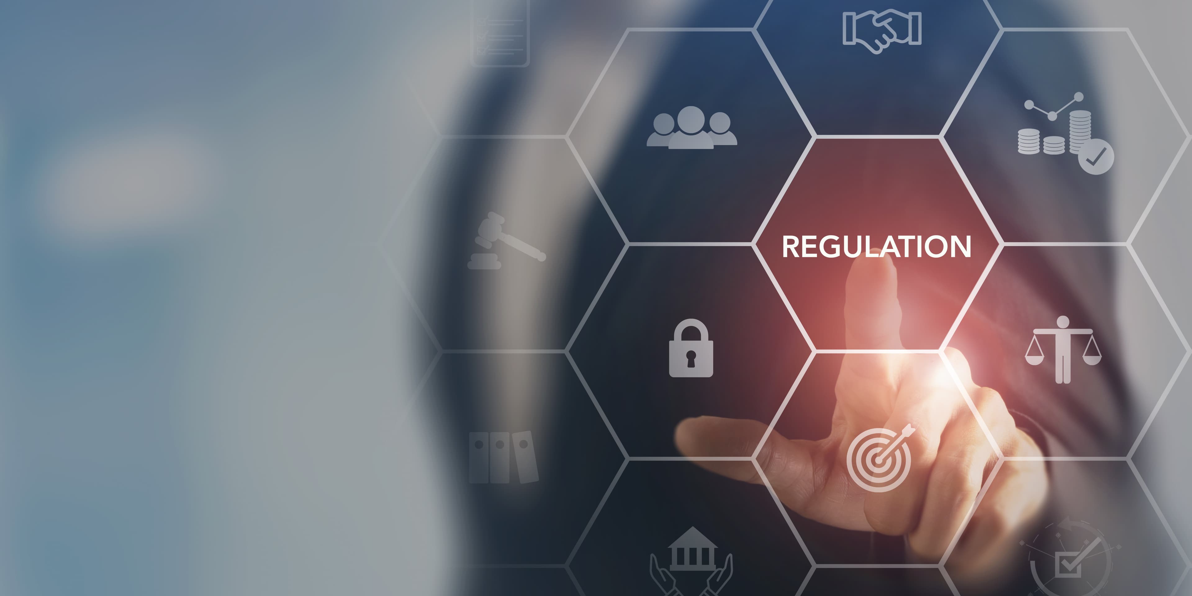 A hand points to a hexagonal grid with icons, highlighting the word "REGULATION" in the center, symbolizing business compliance and governance.