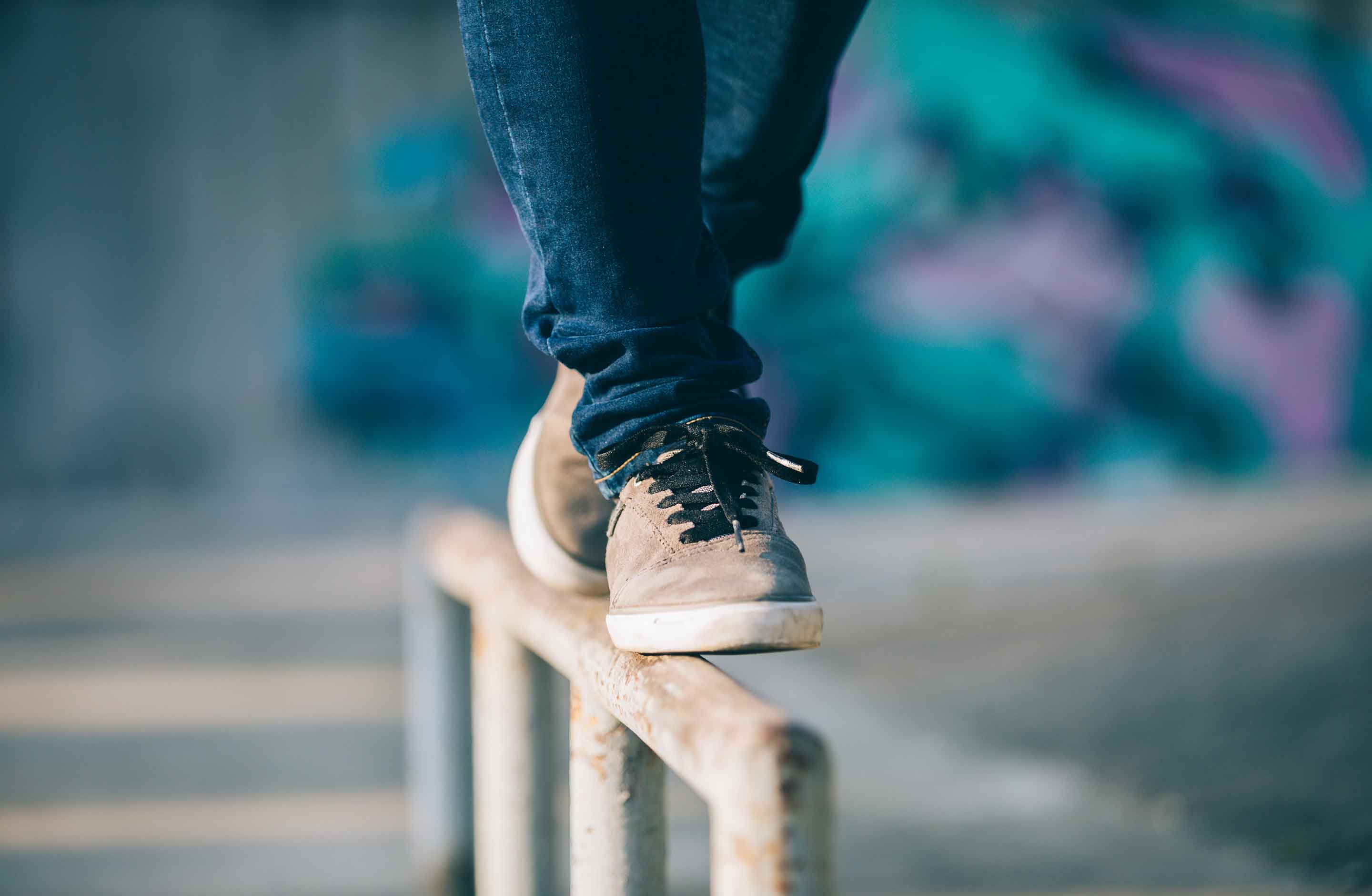 Legs balancing on a beam