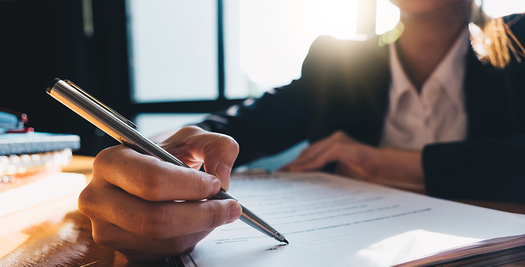 Image of businesswoman writing