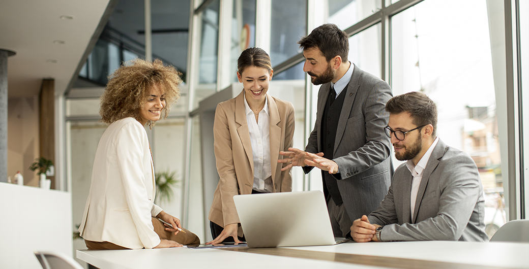 Image of a group of professionals having a meeting in an office