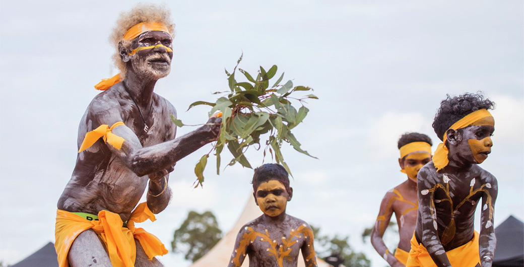 Senior Yolngu man Eddie Gumbula and Gumatj clan boys performing bunggul (ceremonial dance) at the 2019 Garma Festival