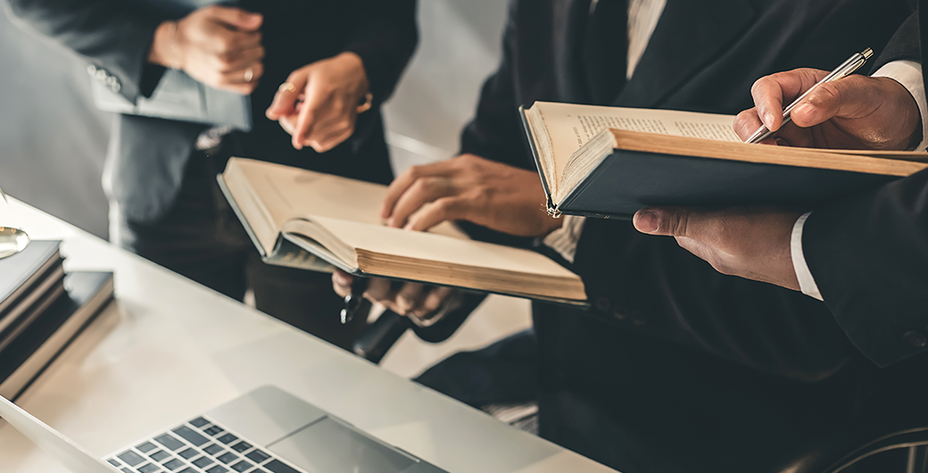 Image of lawyers working together in a meeting