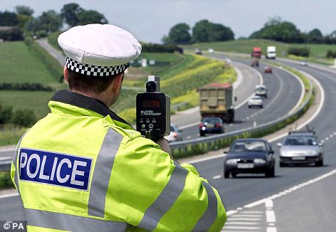 police officer reviewing traffic