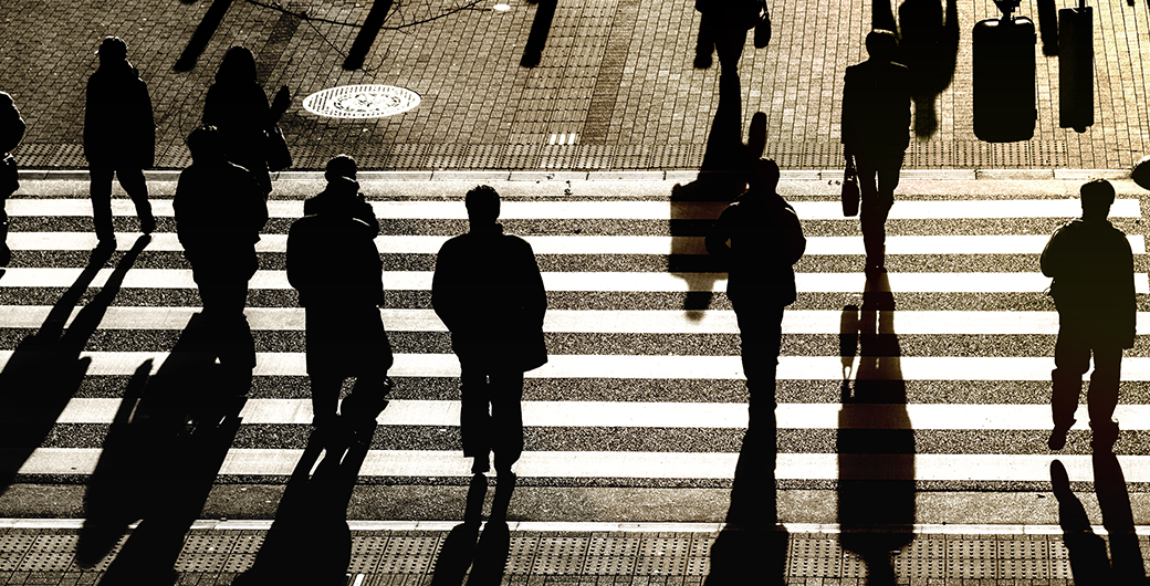 Image of people are walking on a pedestrian crossing