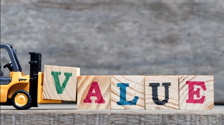 VALUE spelled out in wooden block letters