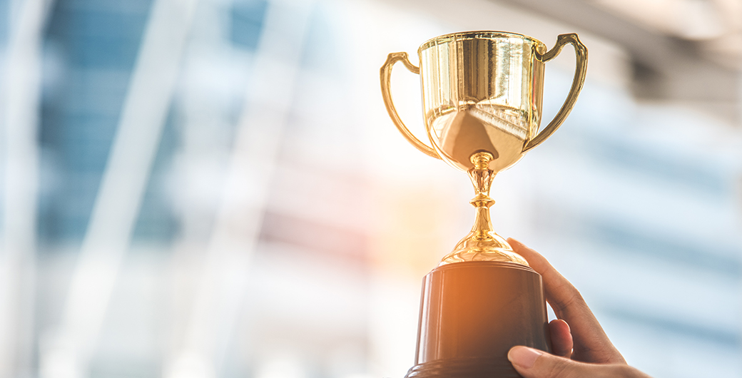 person holding an award