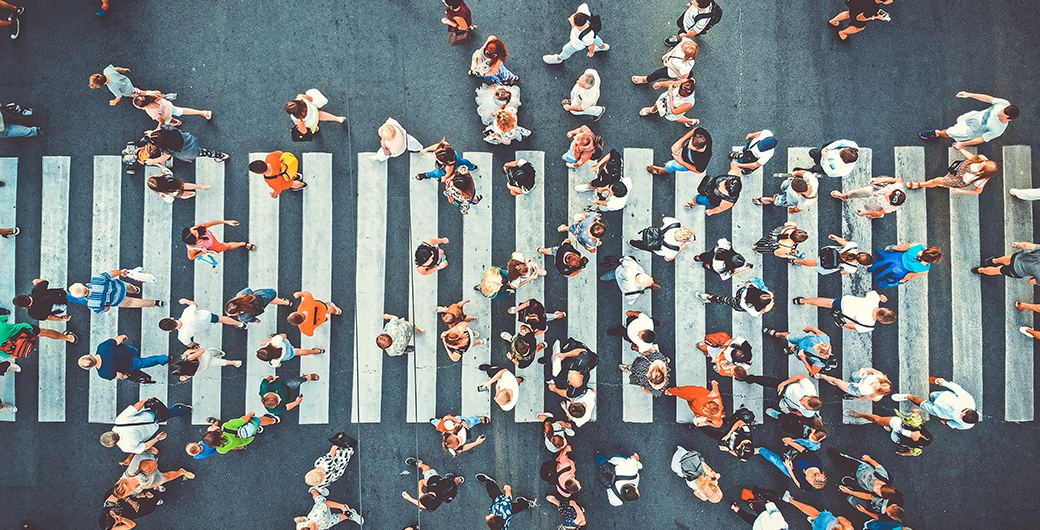 image of a crowd on pedestrian crosswalk